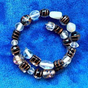 Memory wire wrap bracelet clear black and silver beads with bronze highlights
